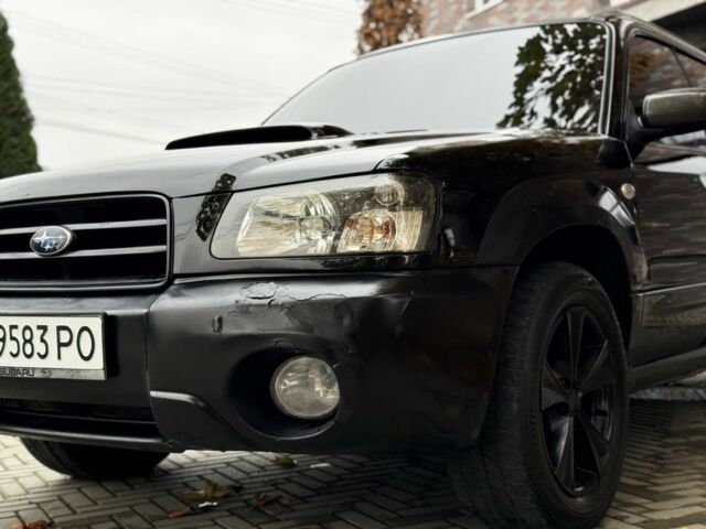 Черный Субару Форестер, объемом двигателя 2 л и пробегом 225 тыс. км за 4600 $, фото 8 на Automoto.ua