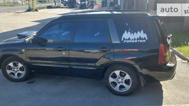 Чорний Субару Forester, об'ємом двигуна 2 л та пробігом 273 тис. км за 6500 $, фото 4 на Automoto.ua