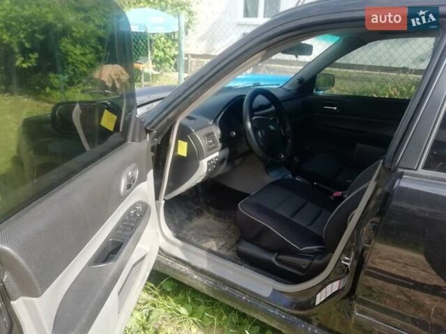 Субару Форестер 2003 в Трускавце на Automoto.ua Черный Субару Форестер, объемом двигателя 1.99 л и пробегом 300 тыс. км за 3300 $, фото 7 на Automoto.ua