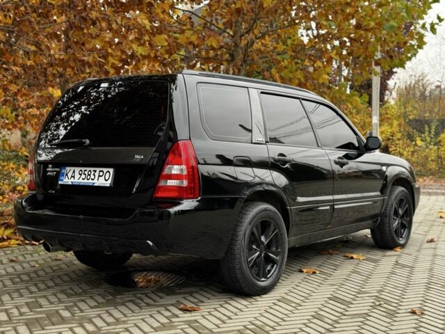 Черный Субару Форестер, объемом двигателя 2 л и пробегом 225 тыс. км за 4600 $, фото 5 на Automoto.ua