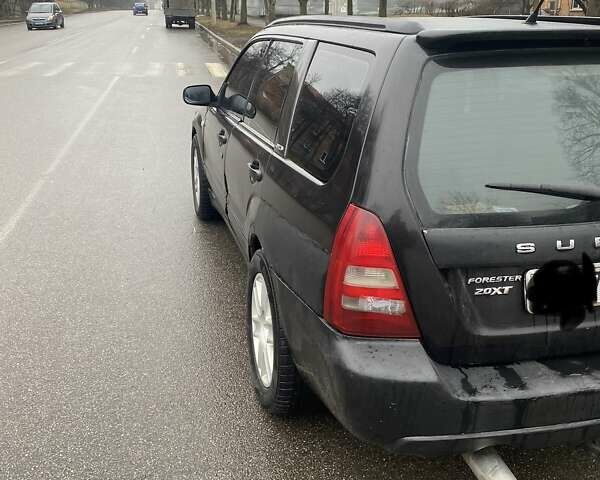 Черный Субару Форестер, объемом двигателя 2 л и пробегом 285 тыс. км за 5500 $, фото 1 на Automoto.ua