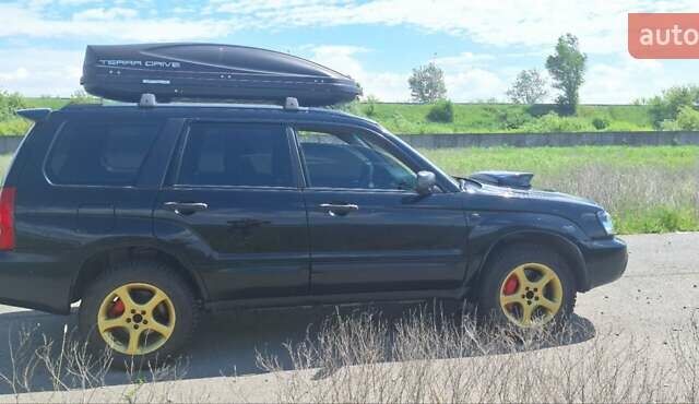 Чорний Субару Forester, об'ємом двигуна 2 л та пробігом 283 тис. км за 6200 $, фото 11 на Automoto.ua