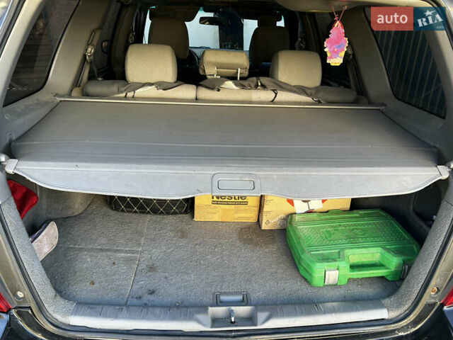 Черный Субару Форестер, объемом двигателя 1.99 л и пробегом 350 тыс. км за 4999 $, фото 1 на Automoto.ua