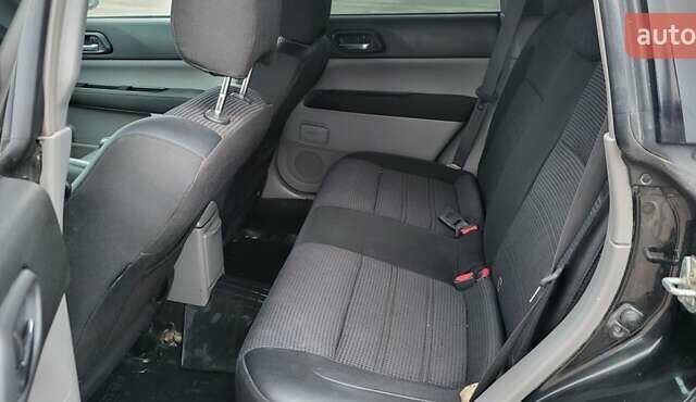 Черный Субару Форестер, объемом двигателя 2 л и пробегом 198 тыс. км за 6000 $, фото 27 на Automoto.ua