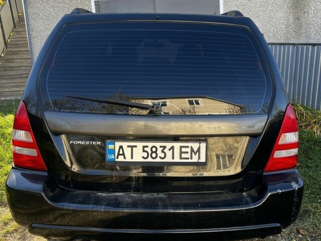 Черный Субару Форестер, объемом двигателя 2 л и пробегом 350 тыс. км за 4999 $, фото 5 на Automoto.ua