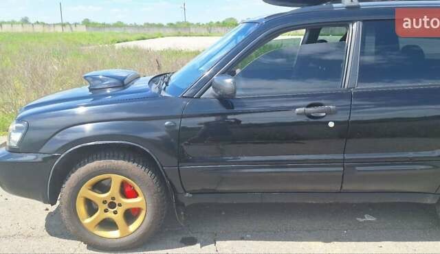 Чорний Субару Forester, об'ємом двигуна 2 л та пробігом 283 тис. км за 6200 $, фото 5 на Automoto.ua