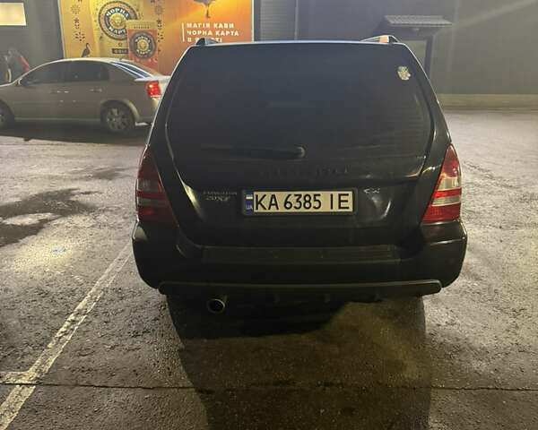 Черный Субару Форестер, объемом двигателя 2 л и пробегом 296 тыс. км за 5600 $, фото 3 на Automoto.ua