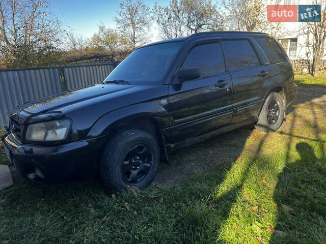 Черный Субару Форестер, объемом двигателя 1.99 л и пробегом 350 тыс. км за 4999 $, фото 2 на Automoto.ua