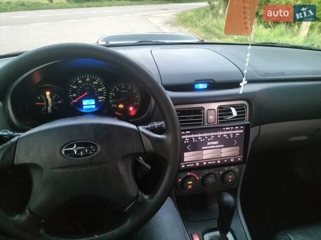 Чорний Субару Forester, об'ємом двигуна 2 л та пробігом 320 тис. км за 5400 $, фото 6 на Automoto.ua