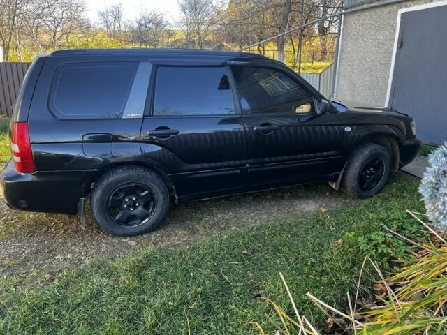 Черный Субару Форестер, объемом двигателя 2 л и пробегом 350 тыс. км за 4999 $, фото 6 на Automoto.ua