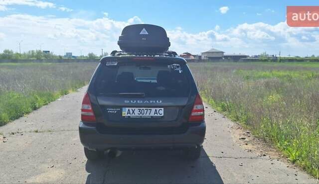 Чорний Субару Forester, об'ємом двигуна 2 л та пробігом 283 тис. км за 6200 $, фото 4 на Automoto.ua