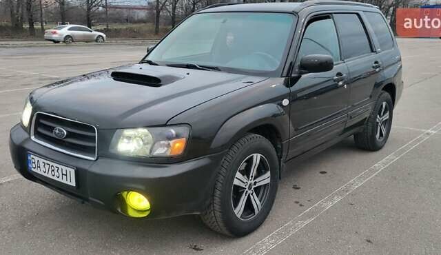 Черный Субару Форестер, объемом двигателя 2 л и пробегом 198 тыс. км за 6000 $, фото 6 на Automoto.ua