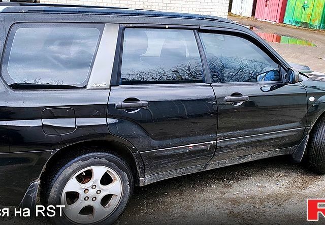 Чорний Субару Forester, об'ємом двигуна 2 л та пробігом 238 тис. км за 3499 $, фото 2 на Automoto.ua