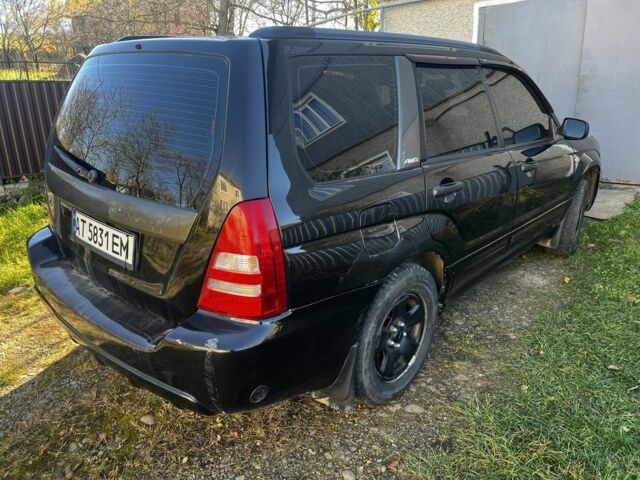 Черный Субару Форестер, объемом двигателя 2 л и пробегом 350 тыс. км за 4999 $, фото 4 на Automoto.ua