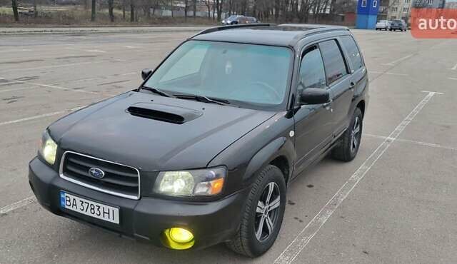 Черный Субару Форестер, объемом двигателя 2 л и пробегом 198 тыс. км за 6000 $, фото 7 на Automoto.ua