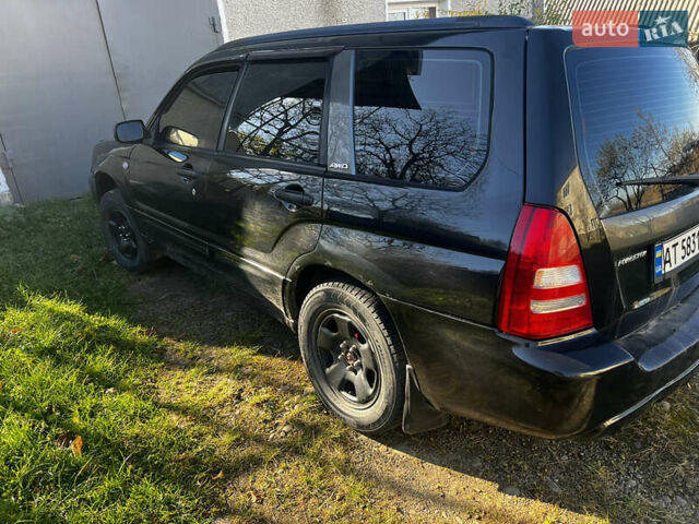 Черный Субару Форестер, объемом двигателя 1.99 л и пробегом 350 тыс. км за 4999 $, фото 3 на Automoto.ua