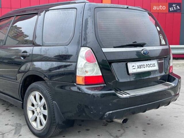 Черный Субару Форестер, объемом двигателя 1.99 л и пробегом 343 тыс. км за 5790 $, фото 5 на Automoto.ua
