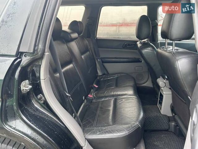 Черный Субару Форестер, объемом двигателя 1.99 л и пробегом 343 тыс. км за 5790 $, фото 13 на Automoto.ua