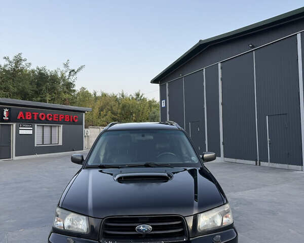 Чорний Субару Forester, об'ємом двигуна 1.99 л та пробігом 250 тис. км за 6999 $, фото 6 на Automoto.ua