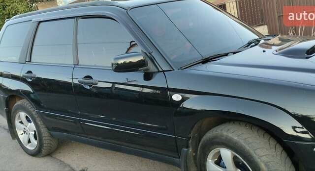 Чорний Субару Forester, об'ємом двигуна 2 л та пробігом 351 тис. км за 5000 $, фото 7 на Automoto.ua