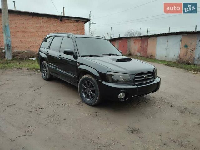 Черный Субару Форестер, объемом двигателя 1.99 л и пробегом 440 тыс. км за 5200 $, фото 3 на Automoto.ua