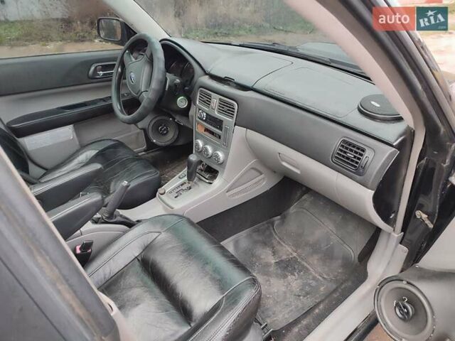 Черный Субару Форестер, объемом двигателя 1.99 л и пробегом 440 тыс. км за 5200 $, фото 9 на Automoto.ua