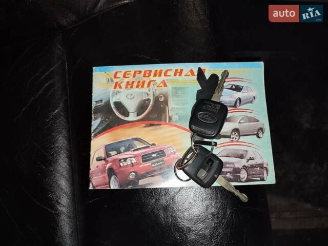 Черный Субару Форестер, объемом двигателя 1.99 л и пробегом 440 тыс. км за 5200 $, фото 10 на Automoto.ua