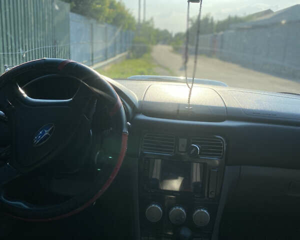 Черный Субару Форестер, объемом двигателя 1.99 л и пробегом 290 тыс. км за 6100 $, фото 6 на Automoto.ua