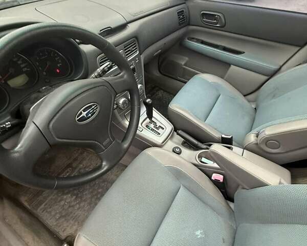 Черный Субару Форестер, объемом двигателя 2 л и пробегом 57 тыс. км за 5500 $, фото 4 на Automoto.ua