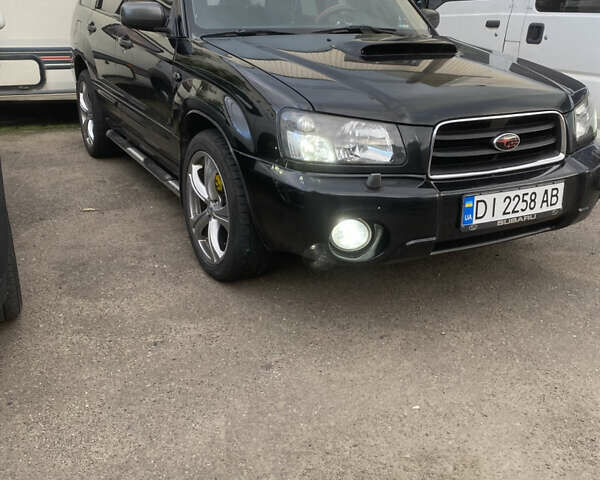 Черный Субару Форестер, объемом двигателя 1.99 л и пробегом 290 тыс. км за 6100 $, фото 8 на Automoto.ua