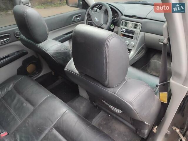 Черный Субару Форестер, объемом двигателя 1.99 л и пробегом 440 тыс. км за 5200 $, фото 12 на Automoto.ua