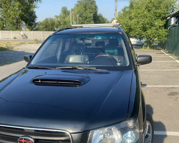 Черный Субару Форестер, объемом двигателя 1.99 л и пробегом 290 тыс. км за 6100 $, фото 1 на Automoto.ua