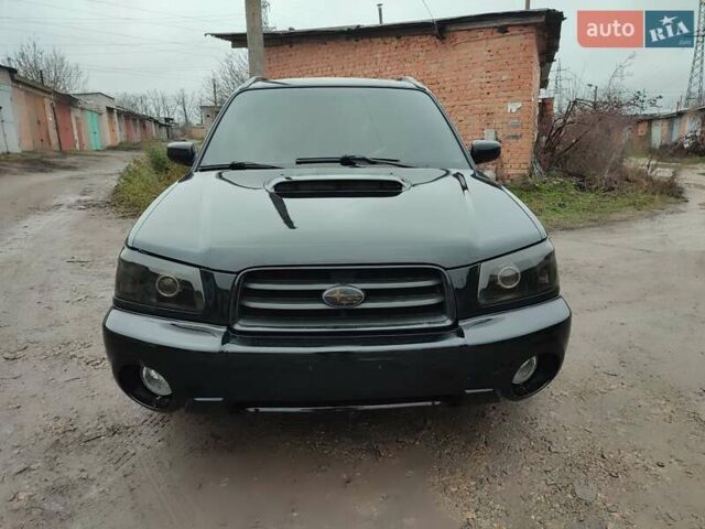 Черный Субару Форестер, объемом двигателя 1.99 л и пробегом 440 тыс. км за 5200 $, фото 4 на Automoto.ua