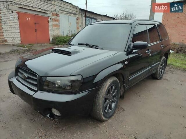 Черный Субару Форестер, объемом двигателя 1.99 л и пробегом 440 тыс. км за 5200 $, фото 5 на Automoto.ua
