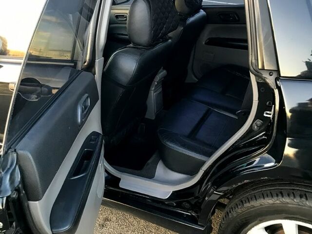 Чорний Субару Forester, об'ємом двигуна 2 л та пробігом 241 тис. км за 6500 $, фото 4 на Automoto.ua