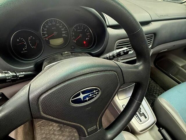 Черный Субару Форестер, объемом двигателя 2 л и пробегом 57 тыс. км за 5500 $, фото 6 на Automoto.ua
