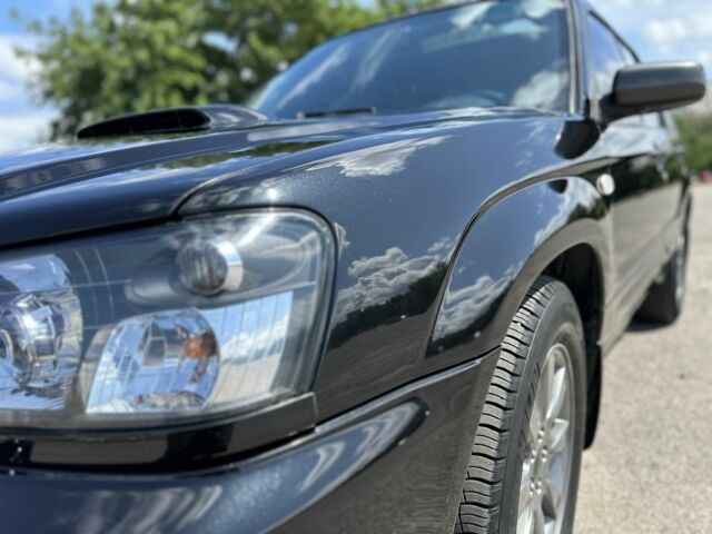 Чорний Субару Forester, об'ємом двигуна 2 л та пробігом 208 тис. км за 5999 $, фото 5 на Automoto.ua