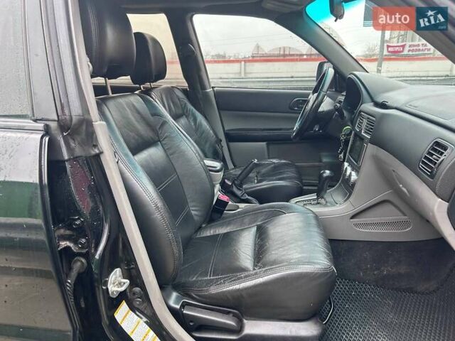 Черный Субару Форестер, объемом двигателя 1.99 л и пробегом 343 тыс. км за 5790 $, фото 10 на Automoto.ua