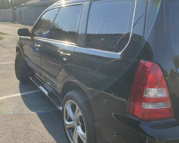 Черный Субару Форестер, объемом двигателя 1.99 л и пробегом 290 тыс. км за 6100 $, фото 3 на Automoto.ua