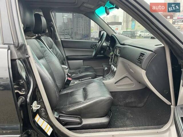 Черный Субару Форестер, объемом двигателя 2 л и пробегом 343 тыс. км за 5990 $, фото 11 на Automoto.ua