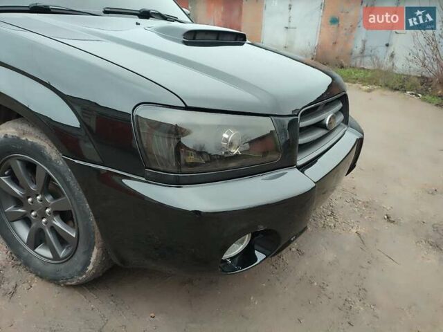 Черный Субару Форестер, объемом двигателя 1.99 л и пробегом 440 тыс. км за 5200 $, фото 1 на Automoto.ua