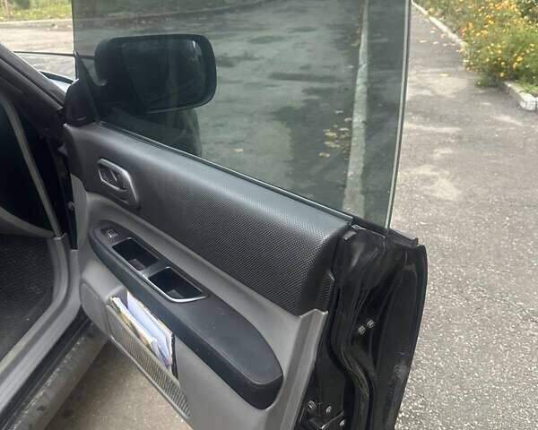 Чорний Субару Forester, об'ємом двигуна 2 л та пробігом 260 тис. км за 5800 $, фото 5 на Automoto.ua
