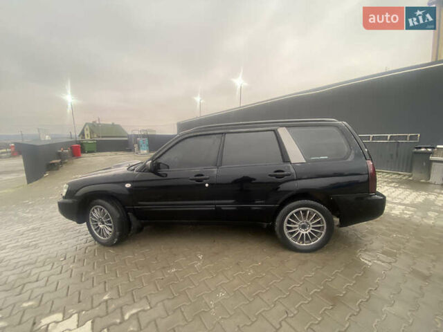 Чорний Субару Forester, об'ємом двигуна 2 л та пробігом 260 тис. км за 6999 $, фото 3 на Automoto.ua