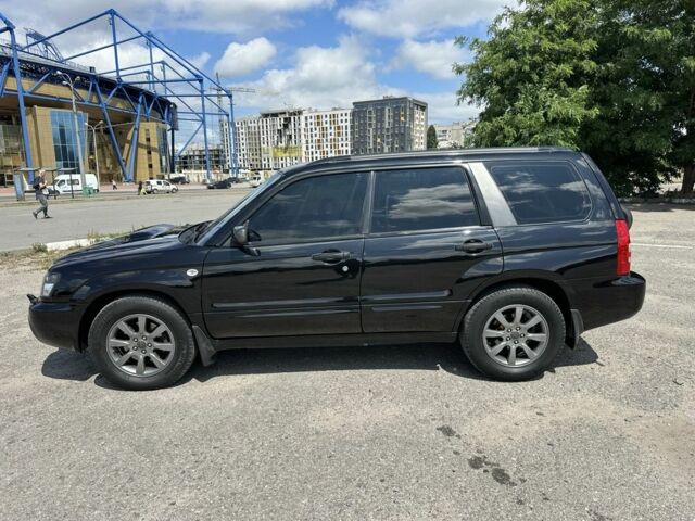 Чорний Субару Forester, об'ємом двигуна 2 л та пробігом 208 тис. км за 5999 $, фото 2 на Automoto.ua