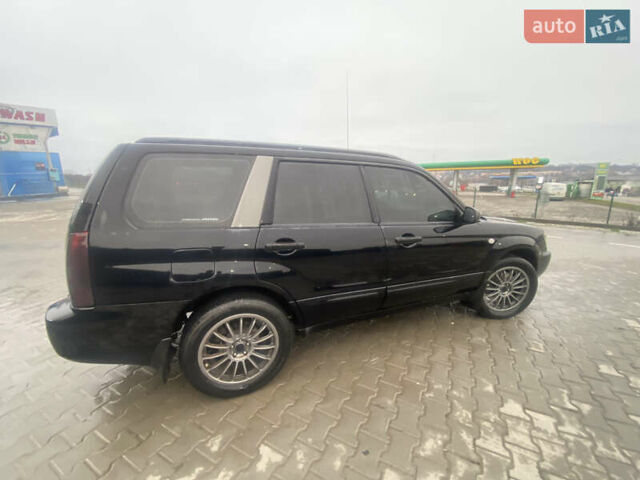 Чорний Субару Forester, об'ємом двигуна 2 л та пробігом 260 тис. км за 6999 $, фото 2 на Automoto.ua
