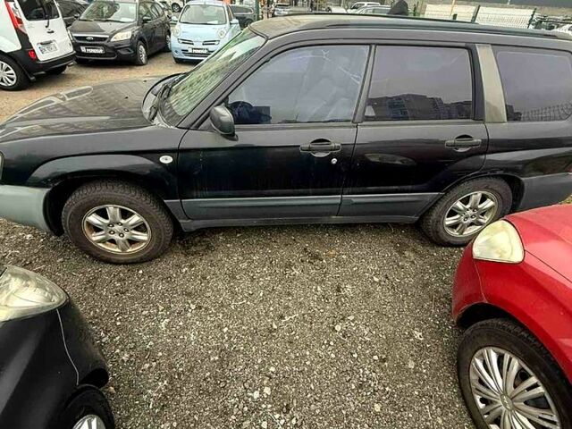 Черный Субару Форестер, объемом двигателя 2 л и пробегом 57 тыс. км за 5500 $, фото 5 на Automoto.ua