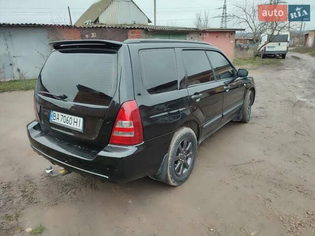 Черный Субару Форестер, объемом двигателя 1.99 л и пробегом 440 тыс. км за 5200 $, фото 7 на Automoto.ua