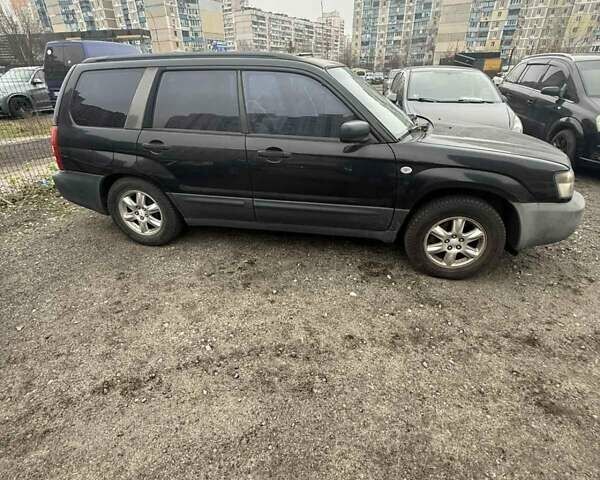 Черный Субару Форестер, объемом двигателя 2 л и пробегом 57 тыс. км за 5500 $, фото 6 на Automoto.ua