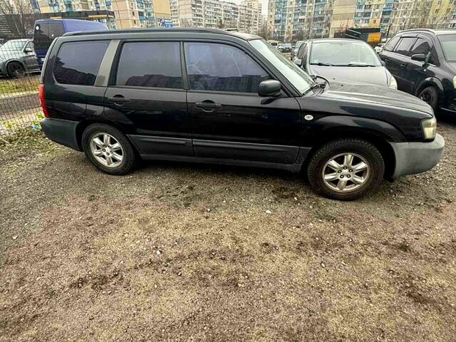 Черный Субару Форестер, объемом двигателя 2 л и пробегом 57 тыс. км за 5500 $, фото 4 на Automoto.ua