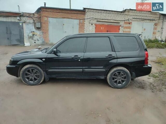 Черный Субару Форестер, объемом двигателя 1.99 л и пробегом 440 тыс. км за 5200 $, фото 2 на Automoto.ua